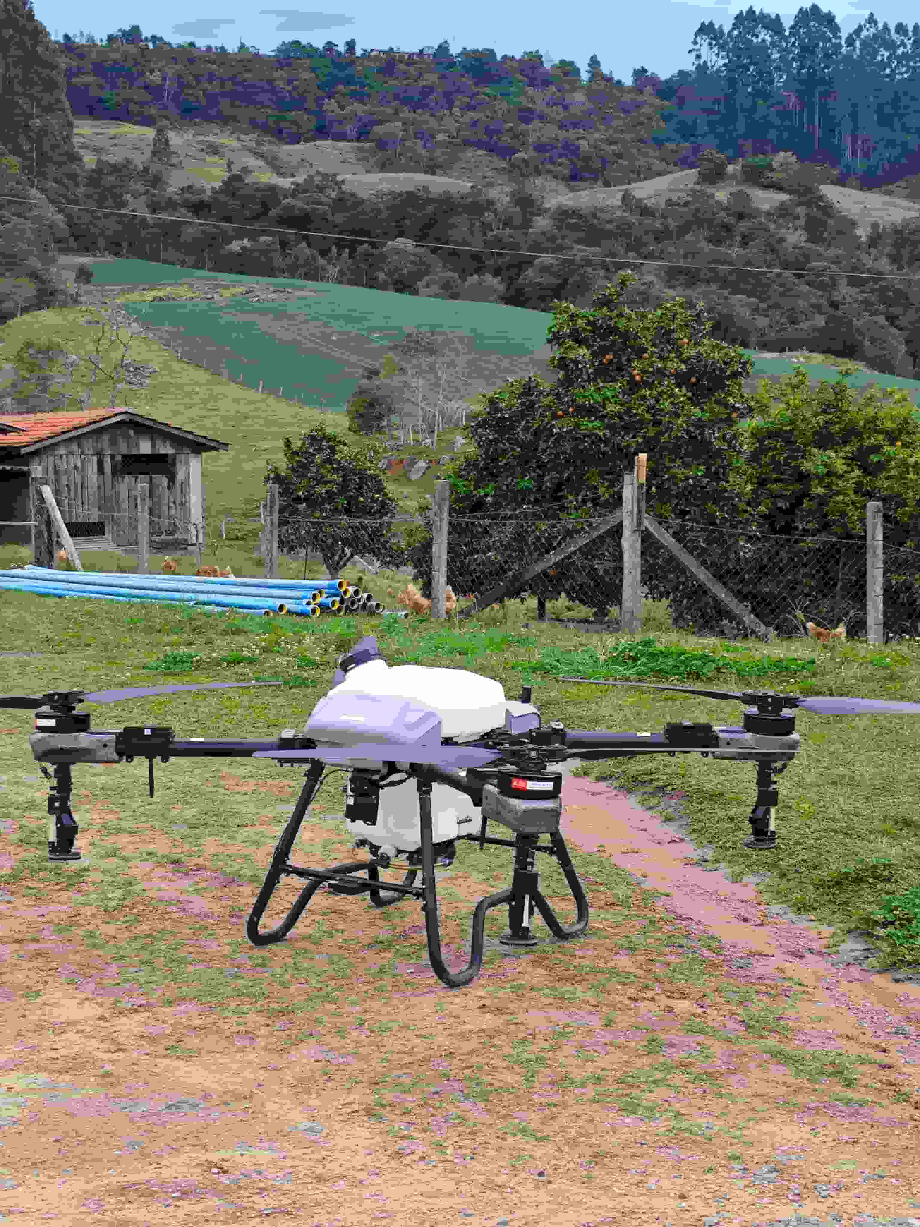 Spraying drone testing at brazilian farm with Topxgun expert